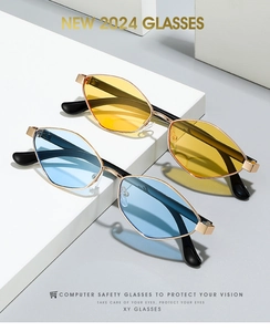 Close-up of irregular metal frame sunglasses with yellow and blue polarized lenses