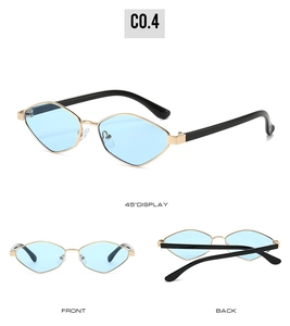 Detailed views of irregular blue polarized lenses and gold metal frame sunglasses