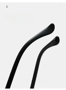 Close-up of curved glossy black sunglass legs designed for ergonomic and comfortable wear