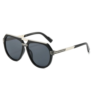 Fashionable navigator sunglasses with black frames and metallic double bridge design