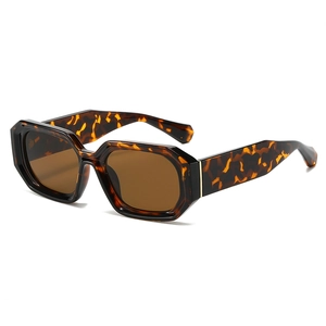 Fashionable leopard print square sunglasses with dark brown lenses and metal hinge detail