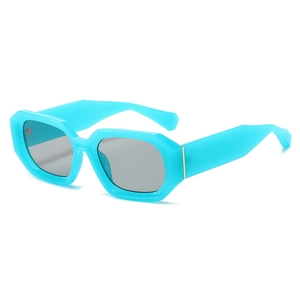 Fashionable cyan hexagonal sunglasses with thick frames and gold metal temple accents