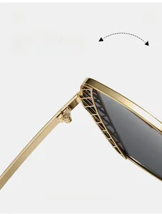 Macro view of durable golden metal hinges with intricate mesh hollow-out design