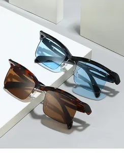 Detailed macro view showing vintage semi-rimless frames and blue-light blocking lenses