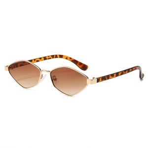 Irregular geometric sunglasses with gold metal frame and polarized brown gradient lenses