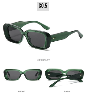 Detail view of dark green square sunglasses with diamond metal rivets on thick frames
