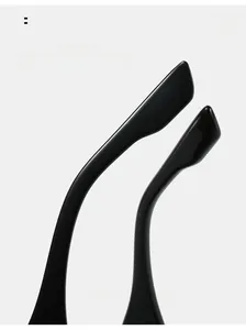 Detail view of glossy black curved temple arms on stylish square frame sunglasses