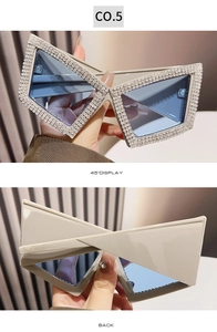 Detailed views of cat eye sunglasses featuring diamond-encrusted frames and blue lenses
