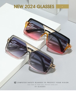 Macro detail of fashionable square sunglasses featuring a metal bridge and gradient lenses