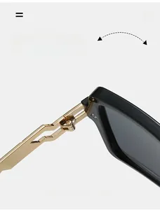 Macro detail of high-quality golden geometric hinge on black thick frame sunglasses