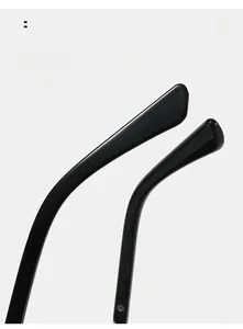 Detail of curved black glossy sunglasses legs for a comfortable and stylish fit