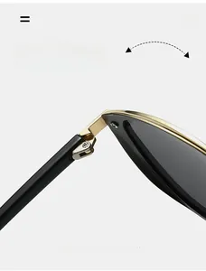 Macro shot of durable gold metal hinges on retro round polarized sunglasses for women