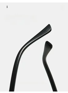 Macro shot of ergonomic curved black temples on polarized stylish round sunglasses