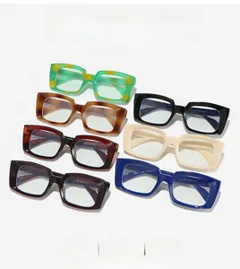 Flat lay of retro square anti-blue light glasses in seven diverse stylish colors