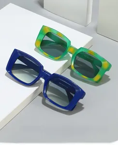 Detail view of square retro sunglasses with model specifications on the inner temple arm