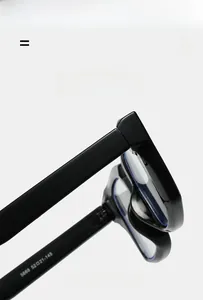 Detail of super elastic black square frames showing hinge quality and model 5668 stamp