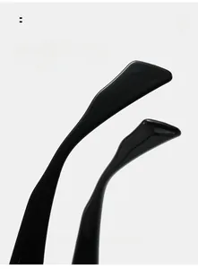 Close-up of sleek black curved temple arms on retro square blue light glasses