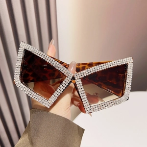 Luxury oversized cat eye sunglasses with leopard print frame and sparkling rhinestones
