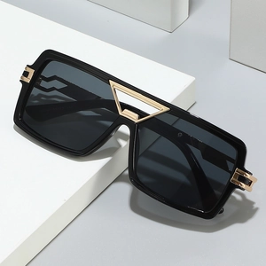 Fashion square color-block sunglasses with gold triangle detail on white geometric block