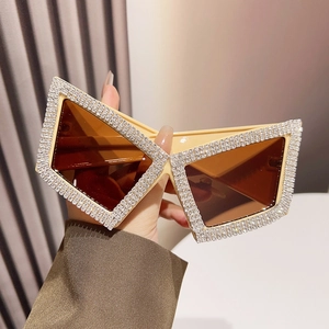 Cat eye oversized sunglasses for women with beige crystal frames and brown lenses