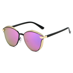Polarized retro round sunglasses for women with pink mercury lenses and gold metal trim