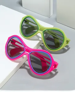 Detail view of colorful cat eye sunglasses on geometric props with model number 5667