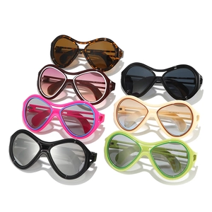Variety of oversized butterfly cat-eye sunglasses in multiple stylish colors with UV protection
