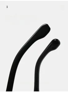 Detail of ergonomic curved temple tips for comfortable fit on black glasses frame
