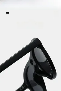 Detail of high-elasticity hinge and glossy black frame on lightweight pilot sunglasses