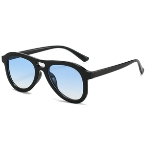 Classic pilot oversized black frame sunglasses with light blue gradient lenses on white backdrop