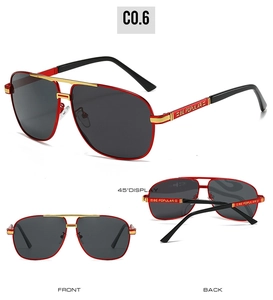 Détail de lunettes aviateur rouges avec double pont doré et logo BE POPULAR