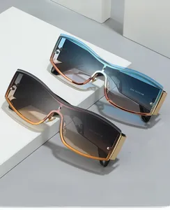 Close-up of square gradient sunglasses with gold metal bridge and model specifications