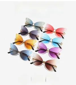 Close-up of frameless butterfly diamond-cut lenses in eight gradient color options