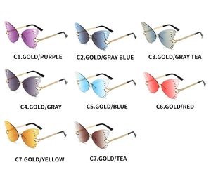 Detailed grid of butterfly-shaped rimless sunglasses in multiple vibrant lens colors
