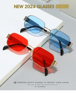 Detail of 2024 vintage polygonal sunglasses with gold frames and colorful lenses