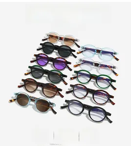 Flat lay display of retro round sunglasses collection in diverse frame colors and lenses