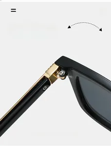 Detail view of durable golden metal hinge on black square vintage sunglasses