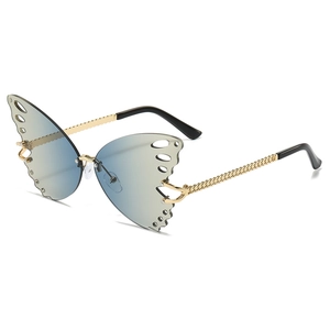 Frameless butterfly shaped sunglasses for women with blue gradient lenses and gold chain arms