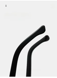 Close-up of curved ergonomic mirror legs on vintage oval sunglasses for comfortable wear