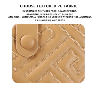 Detail of light brown PU wallet featuring geometric F-stitch pattern and matte snap button