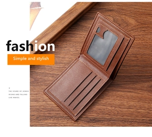 Detail of brown PU leather bifold wallet showing card slots and ID window on wood