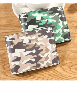 Short bifold wallets for men with camouflage print on wood table background