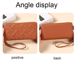 Detail view of caramel long zipper wallet showing front woven texture and smooth back surface
