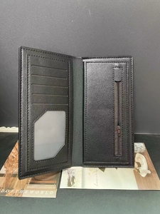 Detail view of men's long wallet with multiple card slots and a vertical zipper pocket