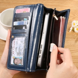 Portefeuille long en cuir souple bleu foncé pour femme avec compartiment zippé et cartes