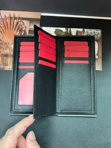 Business style black leather long wallet featuring multiple red card slots and ID window
