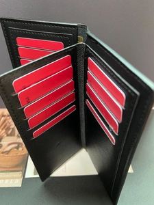Classic black leather long wallet for men featuring multi-card slots and bifold design