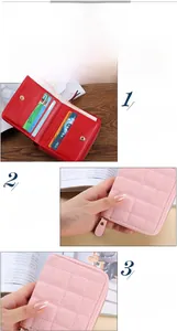 Detail view of mini quilted PU leather wallet with zipper closure and multiple card slots