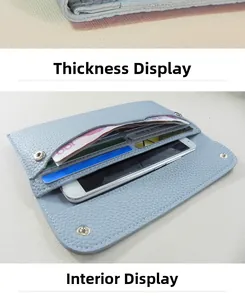 Detail view of the slim pebble leather wallet interior showing card slots and phone pocket