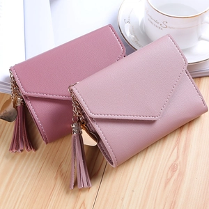 Elegant thin tri-fold faux leather wallet for women with heart pendant and tassel details
